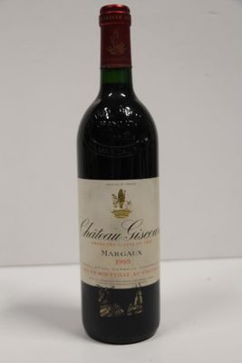 a bottle of wine that is sitting on a table