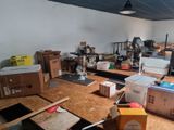 a room with a lot of boxes and boxes on the floor