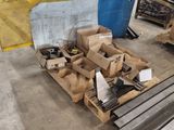 a pile of boxes and boxes on a pallet in a warehouse