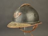 a helmet that is sitting on a glass stand