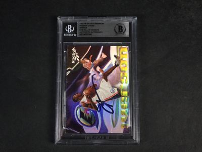a close up of a card on a table with a person holding a tennis racquet