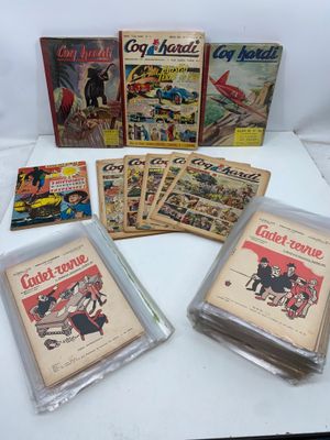 Il y a quelques vieilles bandes dessinées posées sur une table