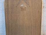 a wooden door with a sign on the side of it