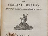 an old book with a picture of a statue on it