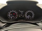 a close up of a car dashboard with a speedometer and gauges