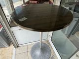 a table that is sitting in front of a glass door