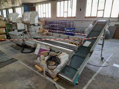a conveyor belt in the middle of a factory