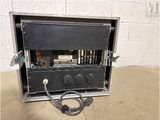 a black case that has a bunch of wires inside of it