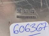 a sticker that says gosso on the side of a metal container