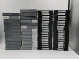 a lot of video games stacked on top of each other