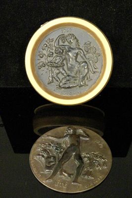 a gold coin with a picture of a woman on it