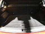 a trunk of a car with the back door open