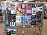 a large metal cage filled with assorted items in a warehouse