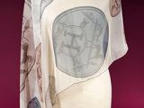 a white scarf on a mannequin on a red surface