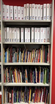 many books on the shelves in the library
