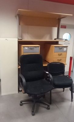 two chairs and a desk in a room with a red ceiling