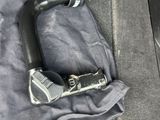 an image of a bike handle in the back seat of a car