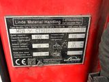 a close up of a label on a red vehicle