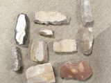a lot of rocks and stones that are on the ground
