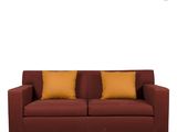 an image of a red couch with orange pillows on it