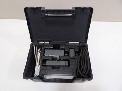 a close up of a black case with wires and wires in it