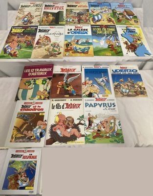 beaucoup de livres posés sur le lit