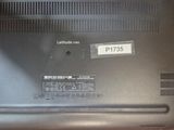 a laptop that has a sticker on the back of it