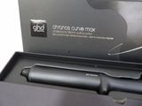 a black box with a black hair dryer inside of it