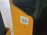 a parking meter that has a sticker on it