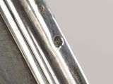 an image of a close up of a metal object on a table