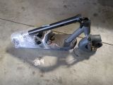 a scooter that is sitting on the ground in the garage