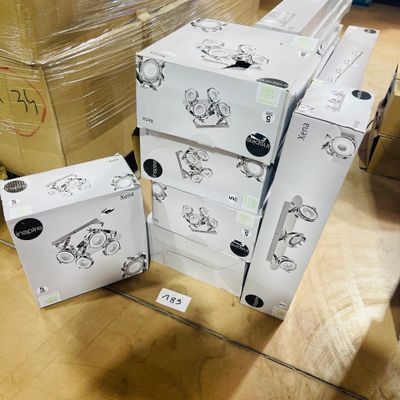 four boxes stacked on top of each other on the floor
