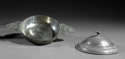 pair of pewwares, one with a bell and the other with a lid