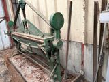 a machine that is sitting on the side of a building