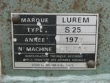 a sign on the side of a machine that says marque type