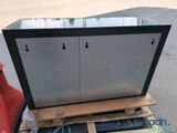 a close up of a metal box sitting on top of a pallet