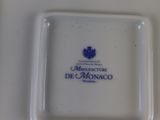 a white plate with a blue and white design on it