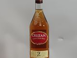 a bottle of liquor sitting on top of a box