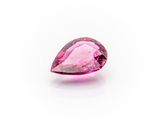 a pink tourmaline gems on a white background
