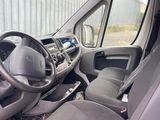 the interior of a van with the driver ' s seat down