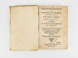 an old book with a black and white title on it