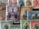many different types of stamps on the table