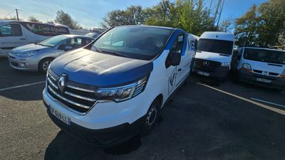 a white van that is parked in a parking lot
