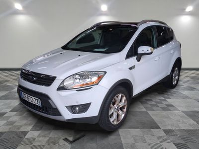 the white ford kuga is parked on a checkered floor