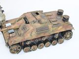 a model of a tank on a white surface