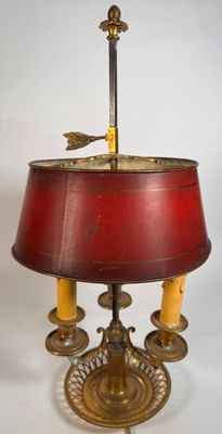 an image of a red lamp with a bird on it