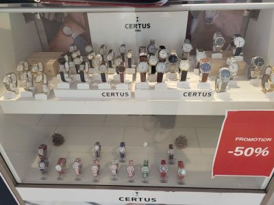 many watches on display in a display case