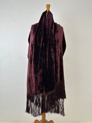 an image of a purple scarf on a mannequin stand