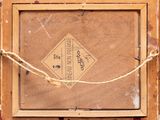an old picture of a box with a rope around it
