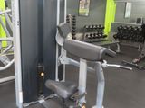 an image of a gym room with equipment in it